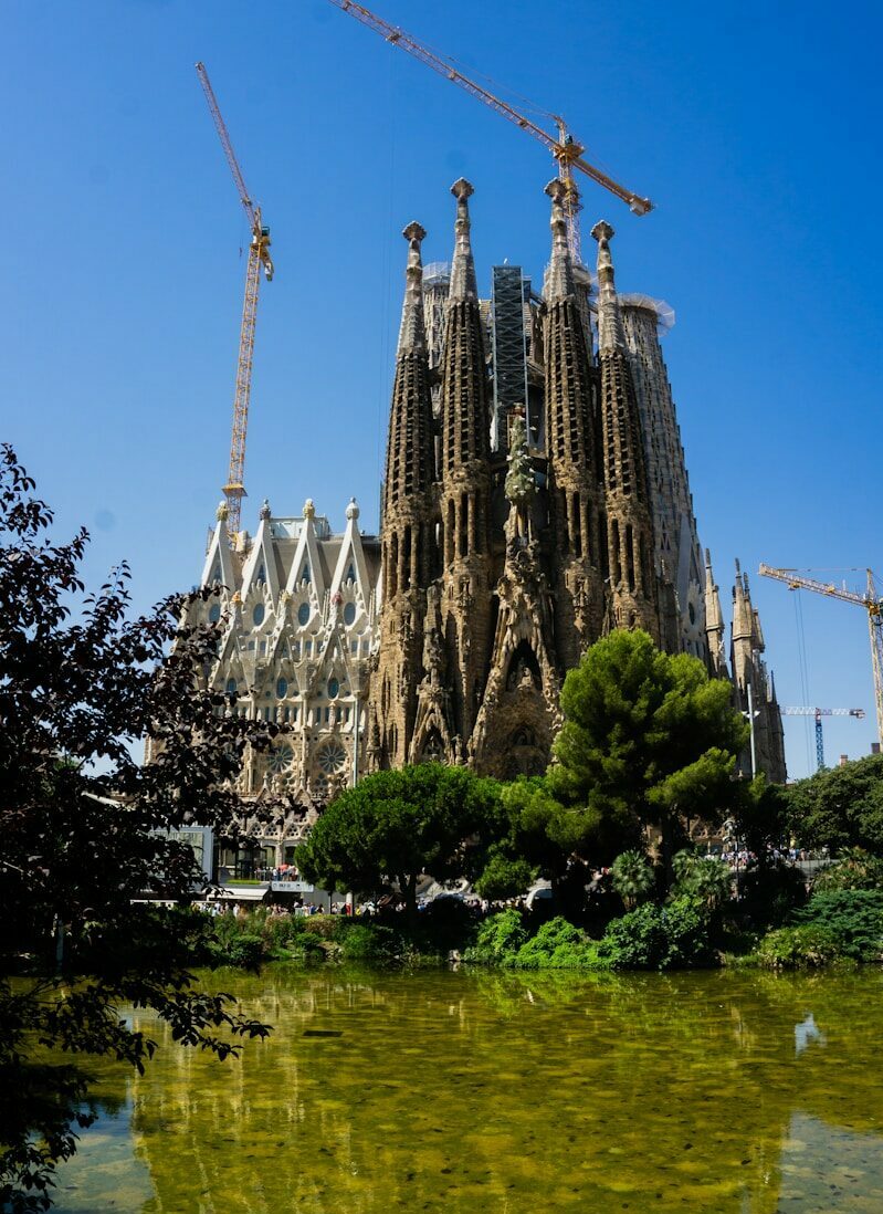 brown and white concrete building under blue sky at daytime
